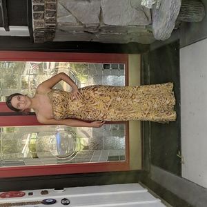 Feminine, one shoulder, long dress with bead work.